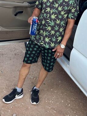 Men's Black Shorts with Green Leaf Print - Casual Hybrid Style
